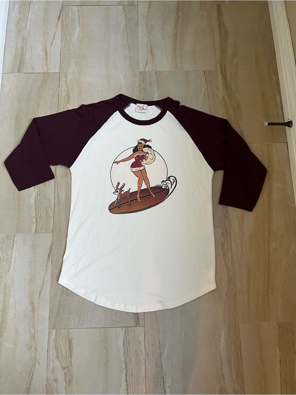 Graphic Raglan Baseball Tee - White and Burgundy with a surfing Santa Girl